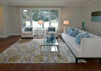 Window, white furniture and large carpet