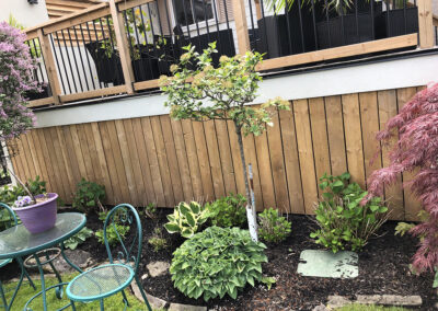 Discoloured back deck before staining
